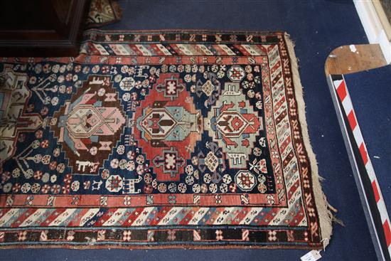 A Shirvan blue ground runner, c.1900, 15ft 6in by 3ft 7in.